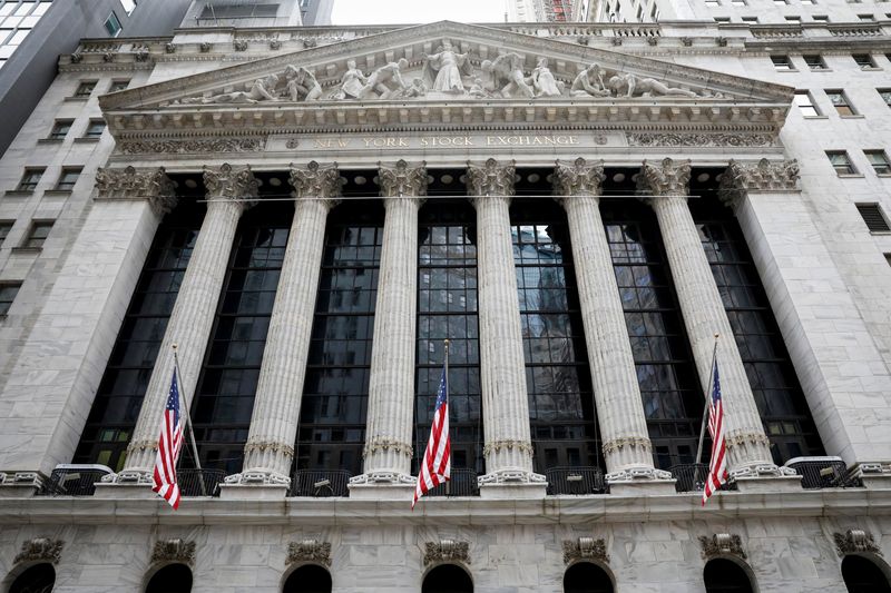 &copy; Reuters. FILE PHOTO: The front facade of the New York Stock Exchange (NYSE) is seen in New York, U.S., February 12, 2021. REUTERS/Brendan McDermid/File Photo