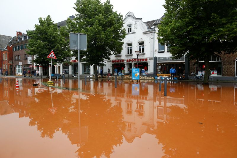 &copy; Reuters. A street is flooded following heavy rainfalls in Erftstadt, Germany, July 16, 2021. REUTERS/Thilo Schmuelgen