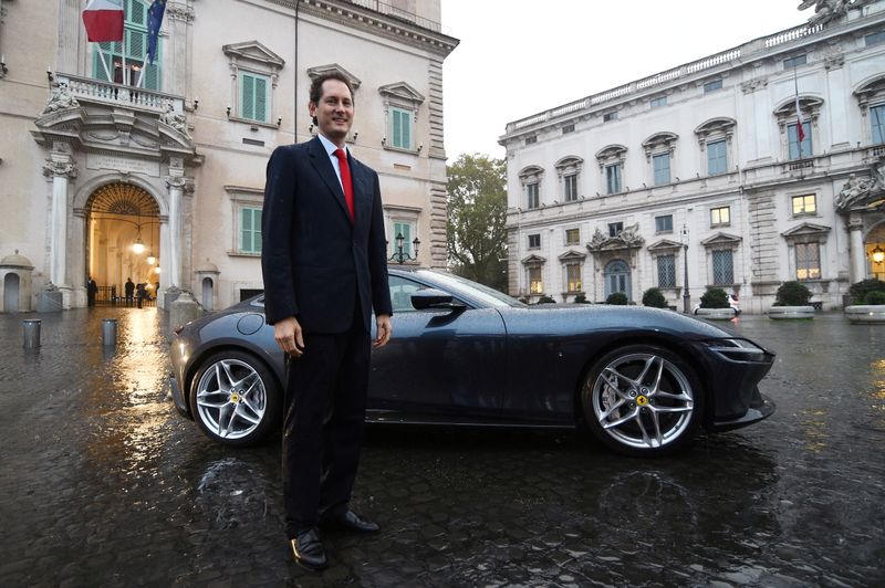 &copy; Reuters. FILE PHOTO: John Elkann poses next to the new Ferrari Roma outside the Quirinale Presidential Palace in Rome, Italy, November 15, 2019. REUTERS/Guglielmo Mangiapane/File Photo