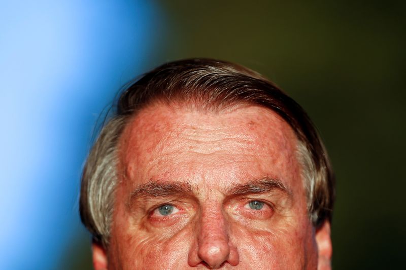 &copy; Reuters. Il presidente brasiliano Jair Bolsonaro, durante una conferenza stampa a margine di una riunione del tribunale federale. Brasilia, 12 luglio 2021. REUTERS/Adriano Machado