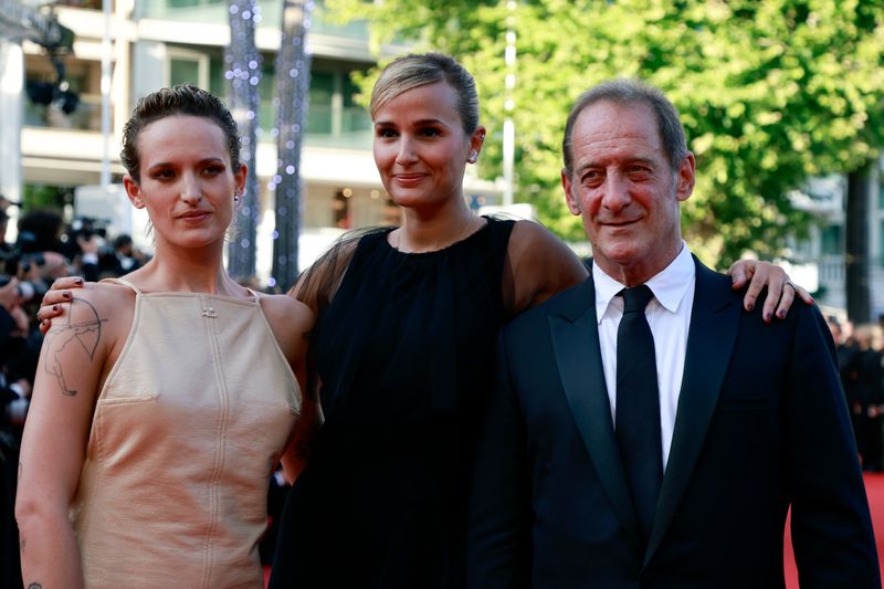 &copy; Reuters. The 74th Cannes Film Festival - Closing ceremony and screening of the film "OSS 117: Alerte Rouge en Afrique Noire" (OSS 117: From Africa with Love) out of competition - Red Carpet Arrivals - Cannes, France, July 17, 2021. Director Julia Ducournau and cas