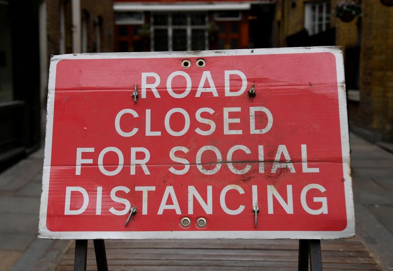 &copy; Reuters. FILE PHOTO: A sign is seen on a road in Covent Garden ahead of a further easing of lockdown restrictions for England on April 12, amid the spread of the coronavirus disease (COVID-19) pandemic, in London, Britain, April 6, 2021. REUTERS/Toby Melville/File