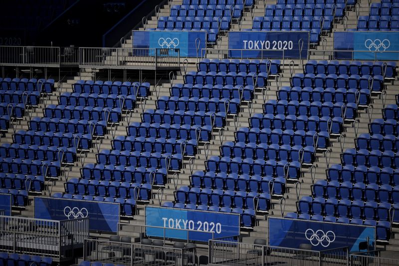 &copy; Reuters. Tokyo 2020 Olympics - Tennis Training - Ariake Tennis Park, Tokyo, Japan - July 19, 2021 General view of Olympics signage and seats inside centre court at the Ariake Tennis Park REUTERS/Hannah Mckay