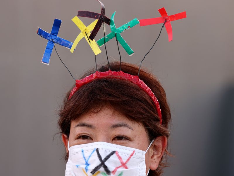 &copy; Reuters. Proteste contro lo svolgimento dei Giochi olimpici di Tokyo 2020. Tokyo, Giappone, 18 luglio 2021 REUTERS/Kim Kyung-Hoon
