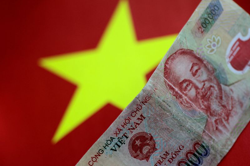 &copy; Reuters. 米財務省は１９日、ベトナム政府と行っていた為替相場の慣習を巡る協議で、ベトナム中央銀行が通貨ドンの競争的な切り下げを実施しないことで合意したと明らかにした。写真は２０１７