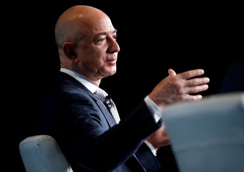 &copy; Reuters. FILE PHOTO: Jeff Bezos, founder of Blue Origin and CEO of Amazon, speaks about the future plans of Blue Origin during an address to attendees at Access Intelligence's SATELLITE 2017 conference in Washington, U.S., March 7, 2017. REUTERS/Joshua Roberts/Fil