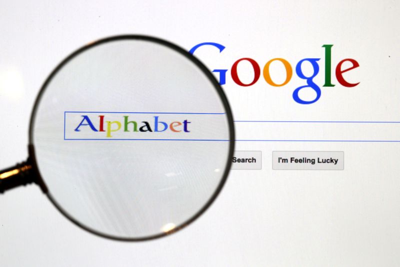 &copy; Reuters. FILE PHOTO: A Google search page is seen through a magnifying glass in this photo illustration taken in Berlin, August 11, 2015.  REUTERS/Pawel Kopczynski//File Photo