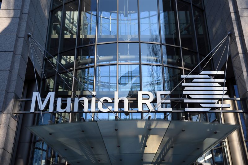 &copy; Reuters. FILE PHOTO: The logo of reinsurance company Munich Re Group is seen next to the entrance of their headquarters as the spread of the coronavirus disease (COVID-19) continues in Munich, Germany, April 4, 2020. REUTERS/Andreas Gebert