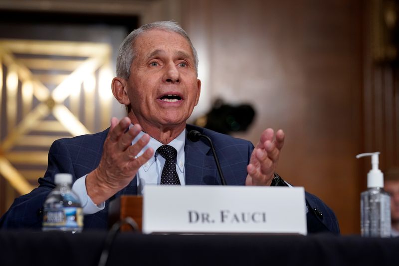 © Reuters. Top infectious disease expert Dr. Anthony Fauci responds to accusations by Sen. Rand Paul (R-KY) as he testifies before the Senate Health, Education, Labor, and Pensions Committee on Capitol hill in Washington, D.C., U.S., July 20, 2021.  J. Scott Applewhite/Pool via REUTERS