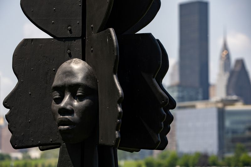 &copy; Reuters. A sculpture by artist Tanda Francis called "Be Heard" is seen in Queensbridge Park, Queens borough of New York, U.S., July 16, 2021. REUTERS/Jeenah Moon