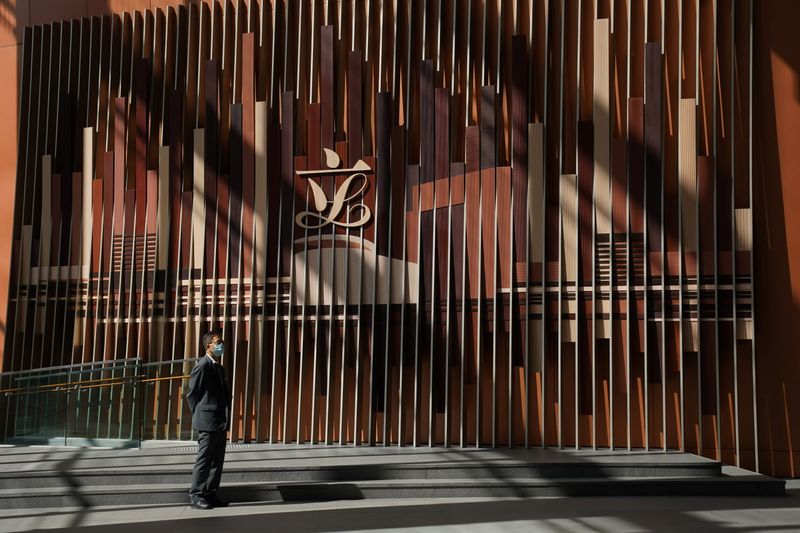 &copy; Reuters. FILE PHOTO: A security guard stands in front of a sign of Legislative Council in Hong Kong, China 26 May, 2021. REUTERS/Lam Yik