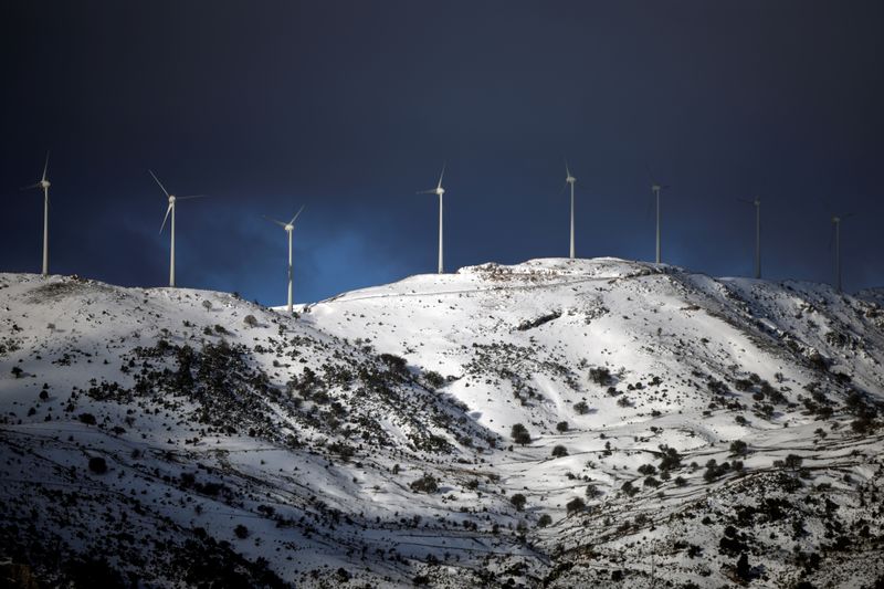 &copy; Reuters. Wind turbines operate on a snowy mountain near the town of Kalavrita, Greece, March 17, 2021.  REUTERS/Alkis Konstantinidis