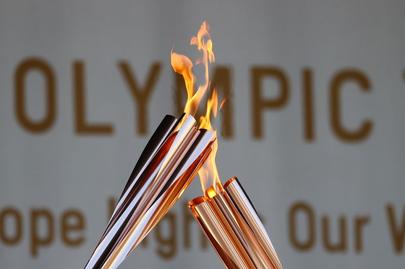 &copy; Reuters. Les Jeux olympiques de Tokyo se sont ouverts mercredi, les épreuves de softball marquant le début d'une compétition qualifiée de "célébration de l'espoir" par le directeur général de l'Organisation mondiale de la Santé (OMS), Tedros Adhanom Ghebr
