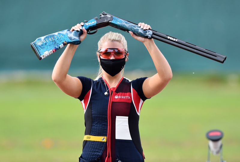 &copy; Reuters. FILE PHOTO: Shooting - ISSF World Cup Shotgun - Lonato, Italy - May 10, 2021  Britain's Amber Hill celebrates second place in the Women's Skeet Final REUTERS/Massimo Pinca