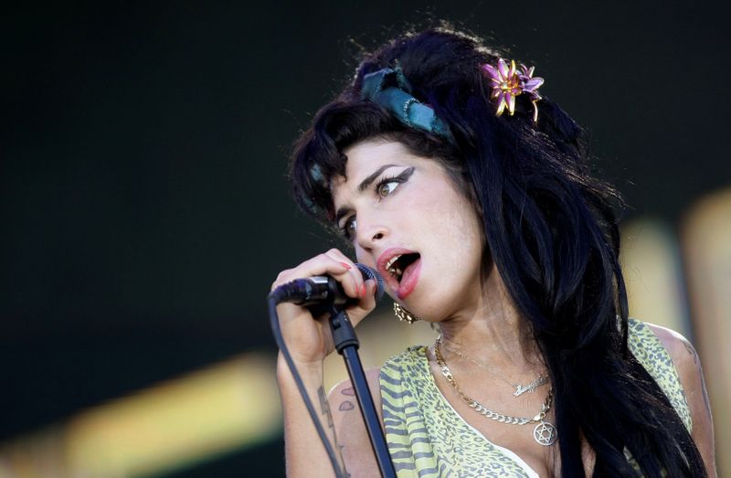 &copy; Reuters. FILE PHOTO: British singer Amy Winehouse performs during the "Rock in Rio" music festival in Arganda del Rey, near Madrid, July 4, 2008. REUTERS/Juan Medina/File Photo