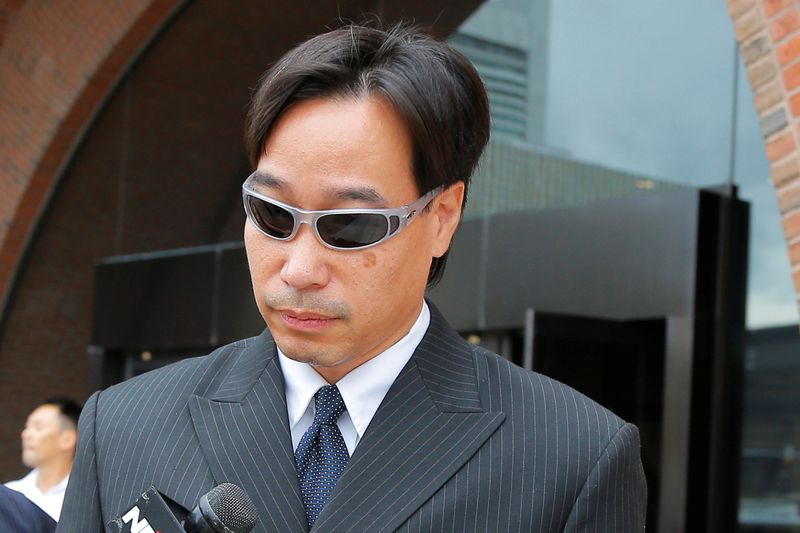 &copy; Reuters. FILE PHOTO: Glenn Adam Chin leaves the federal courthouse in Boston, Massachusetts September 11, 2014 following his arraignment on a mail fraud charge.     REUTERS/Brian Snyder     