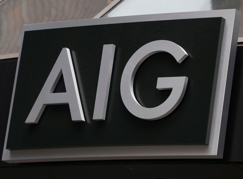 &copy; Reuters. FILE PHOTO: A sign is displayed over the entrance to the AIG headquarters offices in New York's financial district, January 9, 2013. REUTERS/Brendan McDermid/File Photo/File Photo