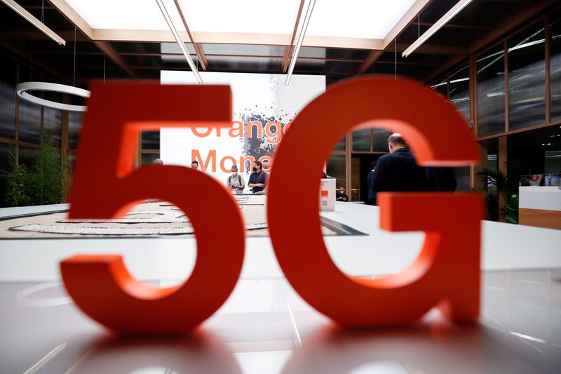 &copy; Reuters. FILE PHOTO: View of a sign at the stand of telecom operator Orange, at the Mobile World Congress (MWC) in Barcelona, Spain, June 29, 2021. REUTERS/Albert Gea/File Photo