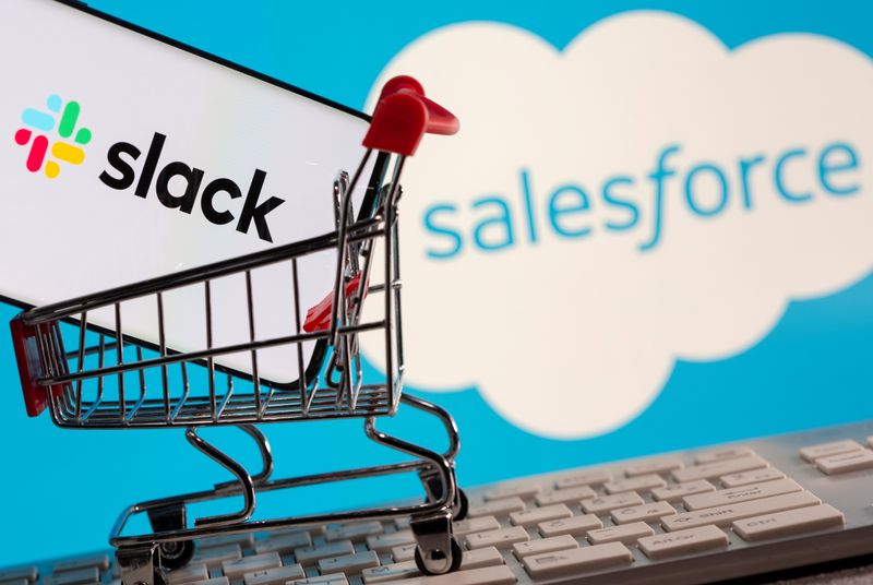 &copy; Reuters. FILE PHOTO: Smartphone with Slack logo stands in a shopping cart on a keyboard in front of displayed Salesforce logo in this picture illustration taken December 1, 2020. REUTERS/Dado Ruvic/Illustration/File Photo