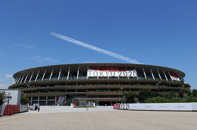 &copy; Reuters. 　７月２２日　    東京五輪・パラリンピック大会組織委員会は２２日、開閉会式の演出を担当する小林賢太郎氏を解任したと発表した。写真は開閉会式が行われる新国立競技場。７月２１