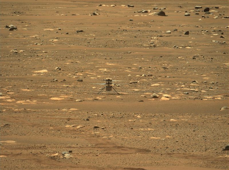 &copy; Reuters. NASA's Mars helicopter Ingenuity makes its first flight on the planet, April 19, 2021. NASA/JPL-Caltech/ASU/Handout via REUTERS THIS IMAGE HAS BEEN SUPPLIED BY A THIRD PARTY.