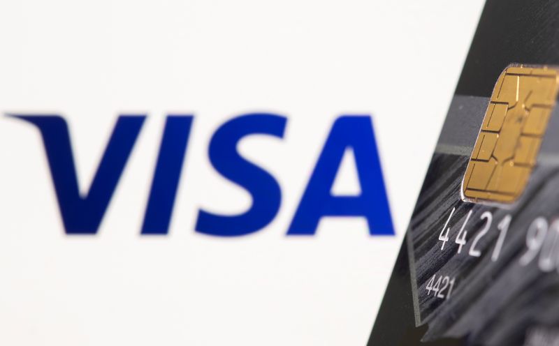 &copy; Reuters. Credit card is seen in front of displayed Visa logo in this illustration taken, July 15, 2021. REUTERS/Dado Ruvic/Illustration