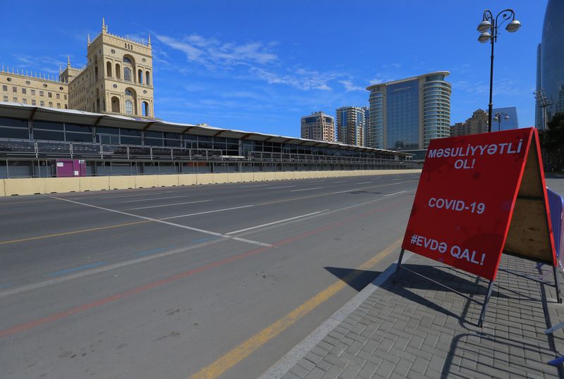 &copy; Reuters. A coronavirus warning sign is seen near the racing track of Formula One Azerbaijan Grand Prix, which was postponed due to coronavirus disease (COVID-19) outbreak in Baku, Azerbaijan April 1, 2020. REUTERS/Aziz Karimov