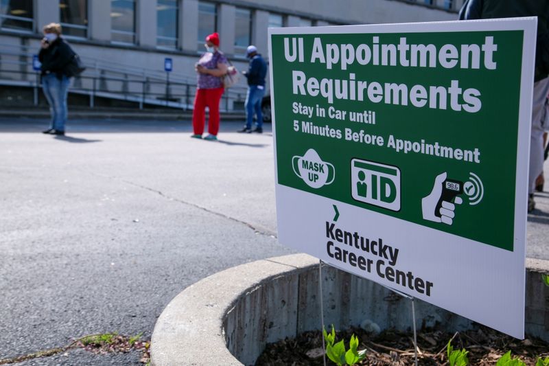 &copy; Reuters. FILE PHOTO: People wait in line as Kentucky Labor Cabinet reopens 13 Regional Career Centers for in-person unemployment insurance services, in Louisville, Kentucky, U.S., April 15, 2021. REUTERS/Amira Karaoud