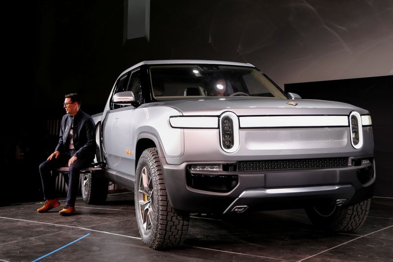 &copy; Reuters. FILE PHOTO: R.J. Scaringe, Rivian's CEO, introduces his company's R1T all-electric pickup truck at Los Angeles Auto Show in Los Angeles, California, U.S. November 27, 2018.  REUTERS/Mike Blake/File Photo