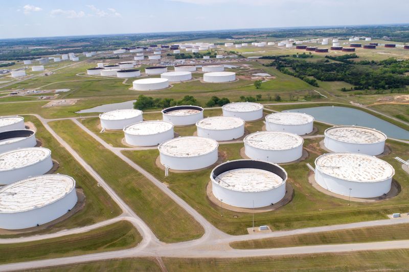 &copy; Reuters. Crude oil storage tanks are seen in an aerial photograph at the Cushing oil hub in Cushing, Oklahoma, U.S. April 21, 2020. REUTERS/Drone Base