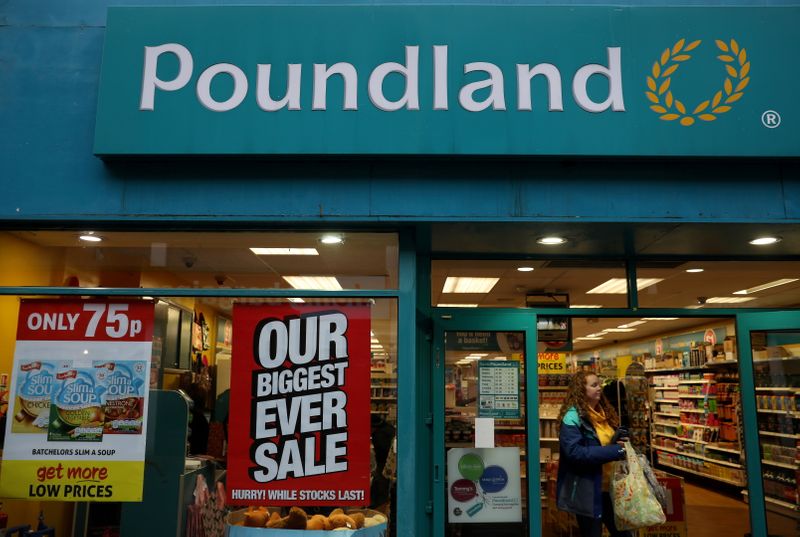 &copy; Reuters. FILE PHOTO: A woman leaves a branch of Poundland in Altrincham, Britain January 7 2020. REUTERS/Phil Noble