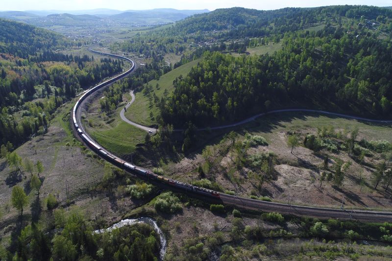 &copy; Reuters. A train moves along the Trans-Siberian railway near Maganskaya railway station outside Krasnoyarsk, Russia June 4, 2019. REUTERS/Ilya Naymushin