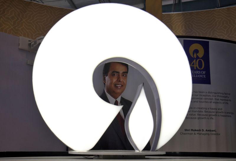 &copy; Reuters. FILE PHOTO: The logo of Reliance Industries is pictured in a stall at the Vibrant Gujarat Global Trade Show at Gandhinagar, India, January 17, 2019. REUTERS/Amit Dave