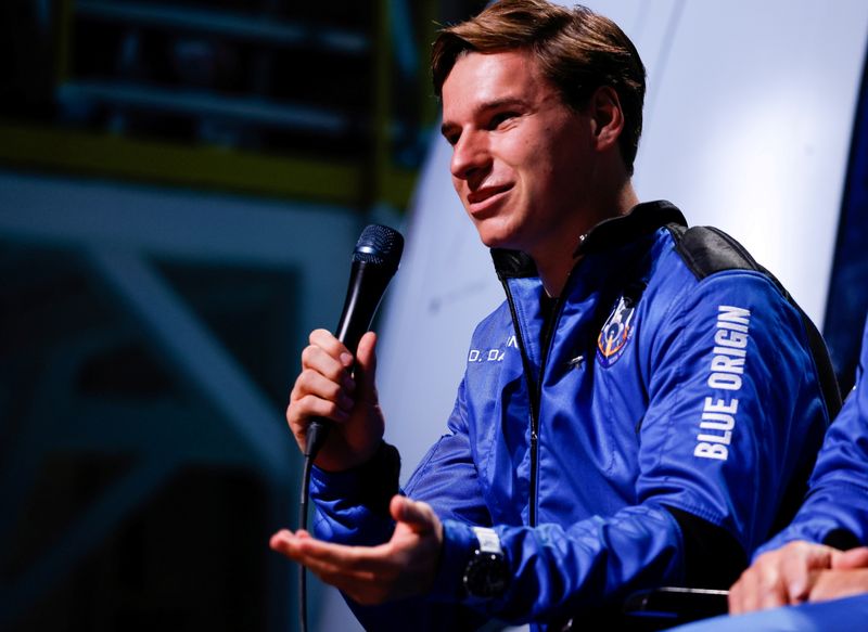 &copy; Reuters. FILE PHOTO: Oliver Daemen, 18, of the Netherlands, speaks at a post-launch press conference after he flew with three crewmates on Blue Origin's inaugural flight to the edge of space, in the nearby town of Van Horn, Texas, U.S. July 20, 2021.   REUTERS/Joe
