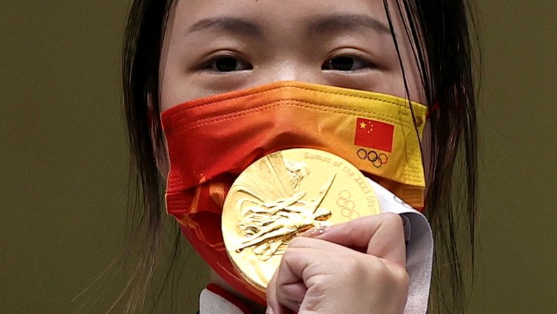 Olympics-Glittering gold distracts from Tokyo woes