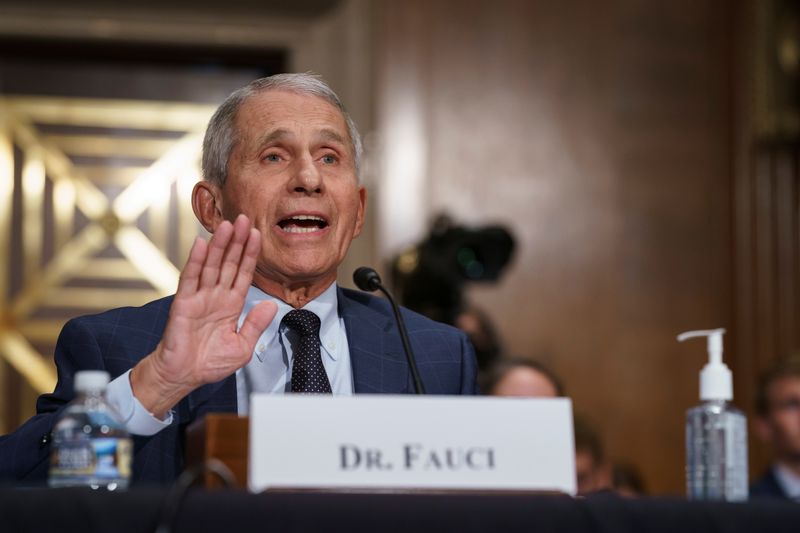 &copy; Reuters. Top infectious disease expert Dr. Anthony Fauci pushes back on statements by Sen. Rand Paul (R-KY) as he testifies before the Senate Health, Education, Labor, and Pensions Committee hearing on Capitol hill in Washington, D.C., U.S., July 20, 2021.  J. Sco