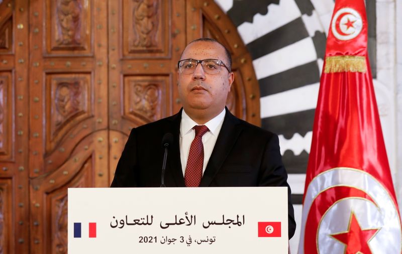 &copy; Reuters. رئيس الوزراء التونسي هشام المشيشي يتحدث خلال مؤتمر صحفي في العاصمة تونس يوم الثالث من يونيو حزيران 2021. تصوير: زبير السويسي - رويترز. 