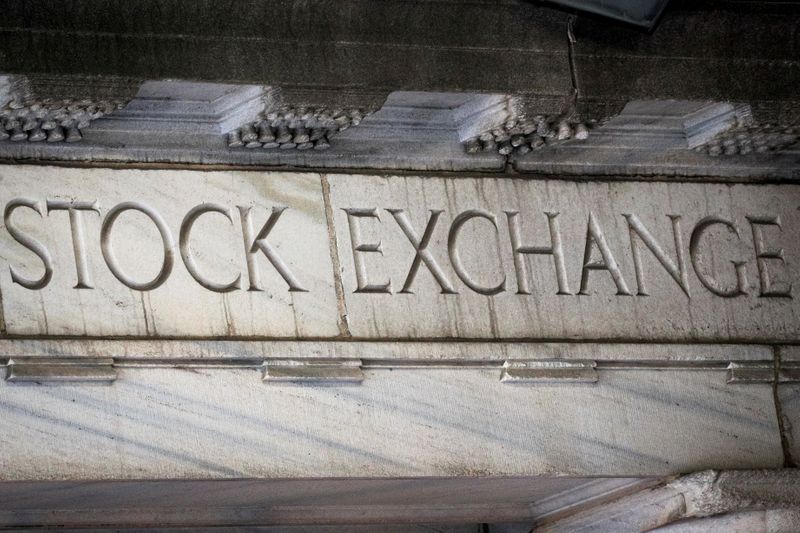 &copy; Reuters. "Stock Exchange" is seen over an entrance to the New York Stock Exchange (NYSE) on Wall St. in New York City, U.S., March 29, 2021.  REUTERS/Brendan McDermid