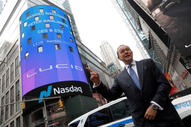 &copy; Reuters. Lucid Motors CEO Peter Rawlinson poses at the Nasdaq MarketSite as Lucid Motors (Nasdaq: LCID) begins trading on the Nasdaq stock exchange after completing its business combination with Churchill Capital Corp IV in New York City, New York, U.S., July 26, 