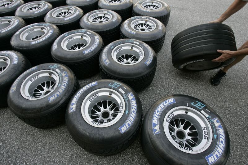 &copy; Reuters. FILE PHOTO: Michelin Formula One tires are prepared for racing in the pits at the Indianapolis Motor Speedway, June 29, 2006.   REUTERS/John Gress/File Photo