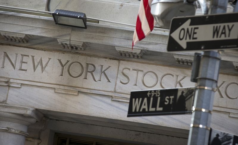 &copy; Reuters. A Wall St. sign is seen outside the entrance of the New York Stock Exchange in New York's financial district August 13, 2015. REUTERS/Brendan McDermid 