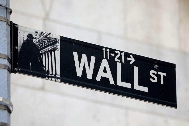 &copy; Reuters. FILE PHOTO: A street sign for Wall Street is seen outside of the New York Stock Exchange (NYSE) in New York City, New York, U.S., June 28, 2021. REUTERS/Andrew Kelly/File Photo