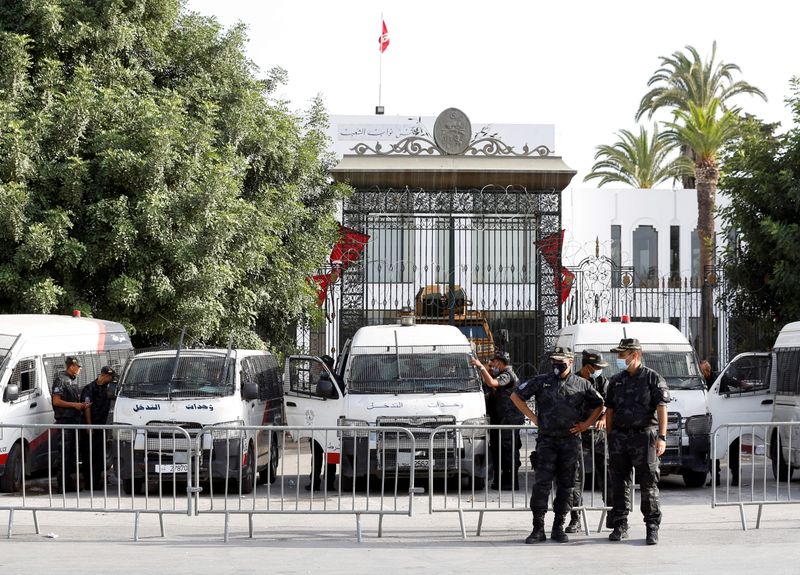 &copy; Reuters. Police officers stand guard outside the parliament building in Tunis, Tunisia  July 27, 2021. REUTERS/Zoubeir Souissi