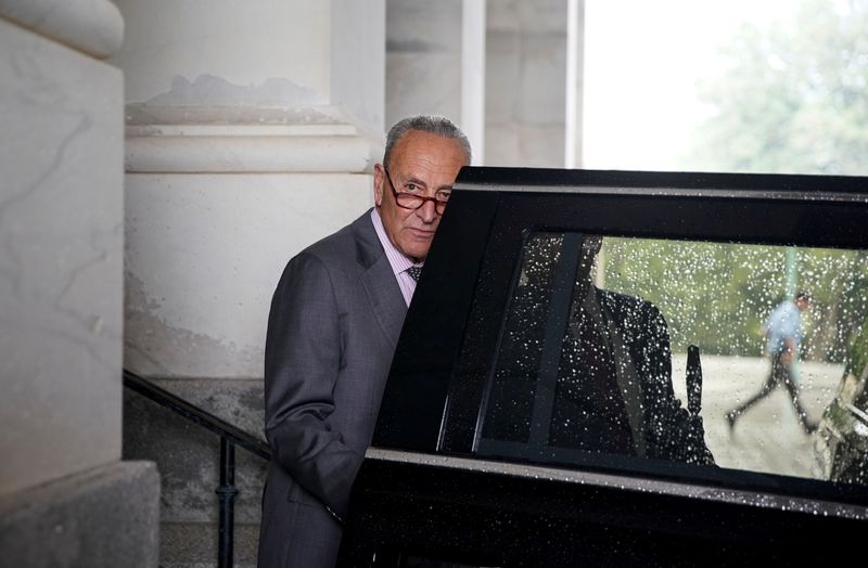 &copy; Reuters. FILE PHOTO: U.S. Senate Majority Leader Chuck Schumer (D-NY) walks to waiting car as he departs the U.S. Capitol in Washington, U.S., July 21, 2021. REUTERS/Elizabeth Frantz 