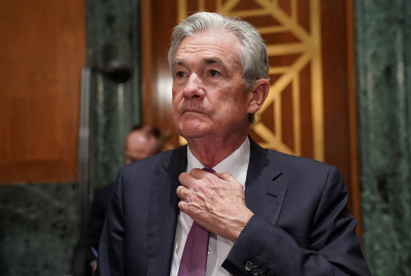 &copy; Reuters. FILE PHOTO: Federal Reserve Chairman Jerome Powell adjusts his tie as he arrives to testify before a Senate Banking, Housing and Urban Affairs Committee hearing on “The Semiannual Monetary Policy Report to the Congress” on Capitol Hill in Washington, 