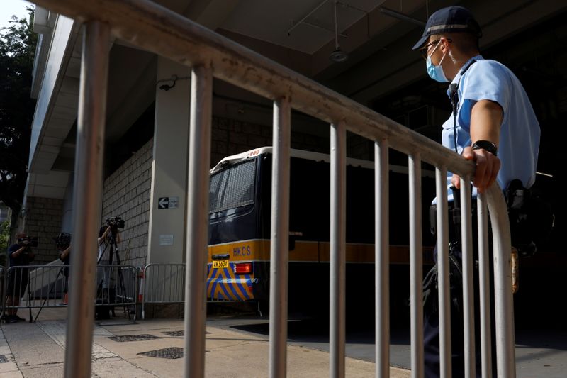 &copy; Reuters. FILE PHOTO: A prison van which is carrying Tong Ying-kit, the first person charged under the new national security law, arrives at High Court for a hearing, in Hong Kong, China July 27, 2021. REUTERS/Tyrone Siu
