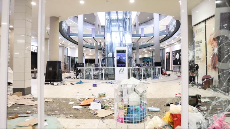 &copy; Reuters. FILE PHOTO: A view shows damage inside a shopping mall following protests that have widened into looting, in Durban, South Africa July 13, 2021, in this screen grab taken from a video. Courtesy Kierran Allen/via REUTERS  