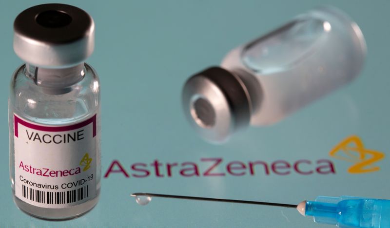 &copy; Reuters. Vial labelled "AstraZeneca coronavirus disease (COVID-19) vaccine" placed on displayed AstraZeneca logo is seen in this illustration picture taken March 24, 2021. REUTERS/Dado Ruvic/Illustration
