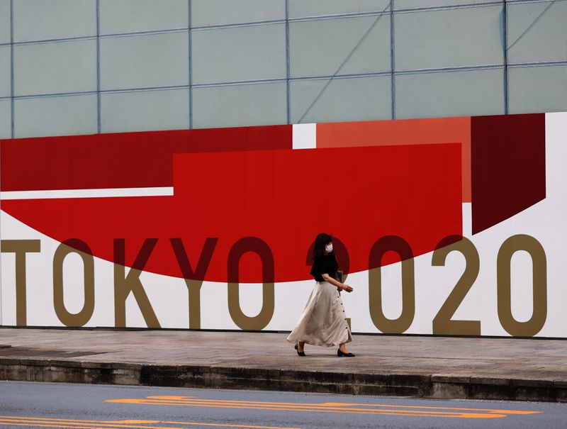 © Reuters. Le gouvernement japonais envisage d'instaurer un état d'urgence sanitaire dans trois préfectures voisines de Tokyo ainsi que dans celle d'Osaka, dans le sud de l'archipel, face à la recrudescence des cas de contamination par le coronavirus, rapporte jeudi l'agence de presse Kyodo. /Photo prise le 29 juillet 2021/REUTERS/Kim Kyung-Hoon