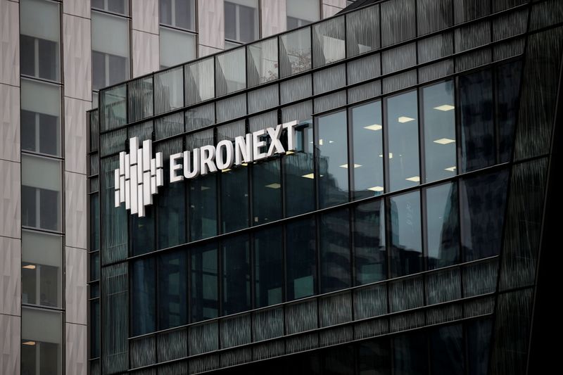 &copy; Reuters. FILE PHOTO: The Euronext logo is seen at the financial and business district of La Defense, amid the outbreak of the coronavirus disease (COVID-19), in Paris, France, November 10, 2020. REUTERS/Benoit Tessier/File Photo